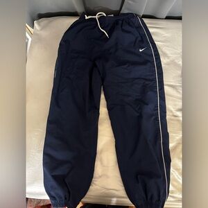 NIKE TRACK PANTS RED TAG